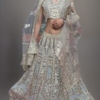 The Allure of Golden Mirror Work Lehenga: Perfect Attire for Special Occasions rent only